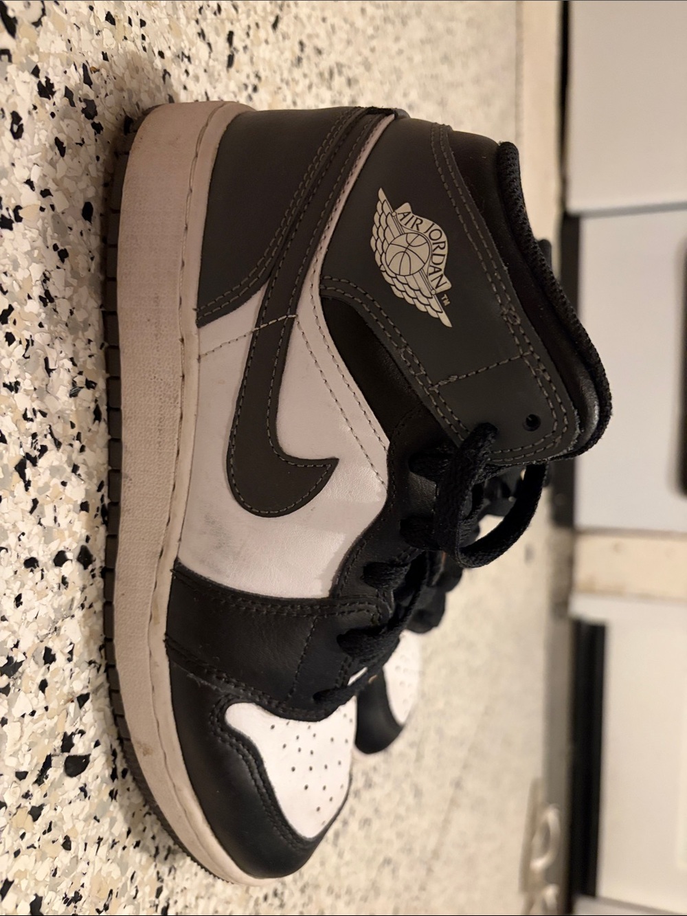Jordan Kids Black and White High-Top Sneakers